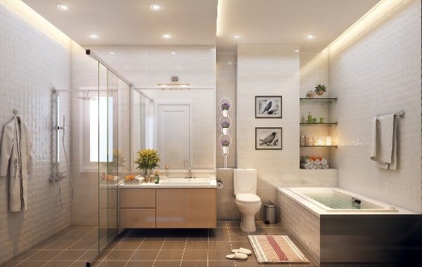 Khu vực nhà tắm - vệ sinh được ngăn cách bằng tấm kính cường lực giúp căn phòng trông rộng rãi, thông thoáng hơn.