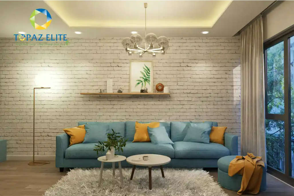 Phòng khách nhà mẫu Topaz Elite với bộ ghế sofa màu xanh nhẹ nhàng, dịu mắt.