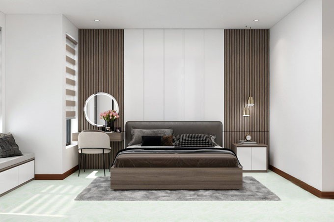 Phòng ngủ lớn dành cho vợ chồng gia chủ với thiết kế nội thất tối giản, hiện đại.