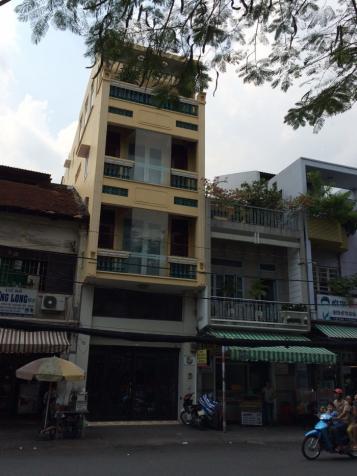 Cho thuê toà nhà bunding mặt tiền đường Trần Hưng Đạo, có hệ thống thang máy 9309890