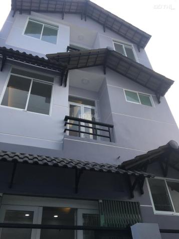 Bán nhà đẹp trệt + 2 lầu, mới đẹp, cách MT Nơ Trang Long chỉ 20m, gần Vincom 12676489