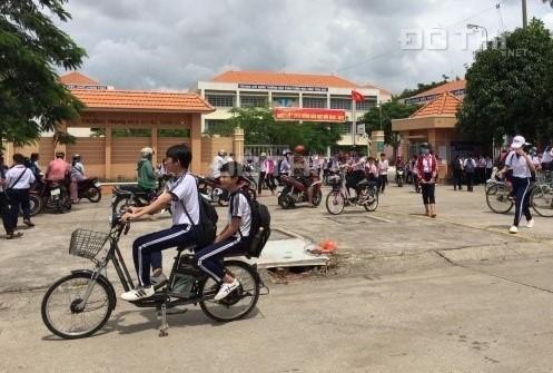 Đất mặt tiền đường lộ giới thổ cư sổ sẵn cầm tay nằm ngay trung tâm chợ. LH 0931234613 12799137