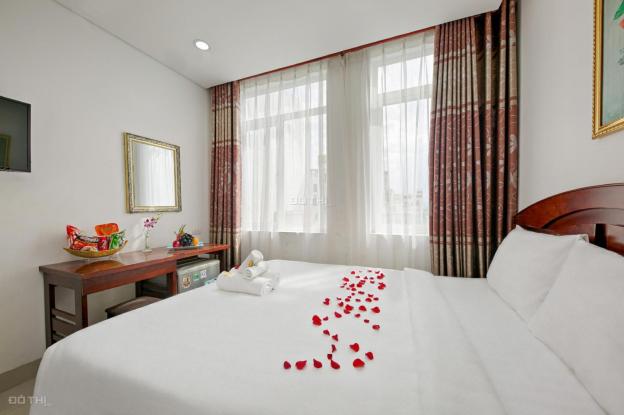 Cần gấp tiền bán nhanh khách sạn đường Trần Bạch Đằng, 8 tầng, 18 phòng, đang kinh doanh tốt 12898727