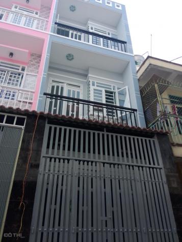 Bán nhà 3 lầu, góc 2MT đường Lê Quang Định, BT. 7x28m, nở hậu, NH đang thuê 12899144