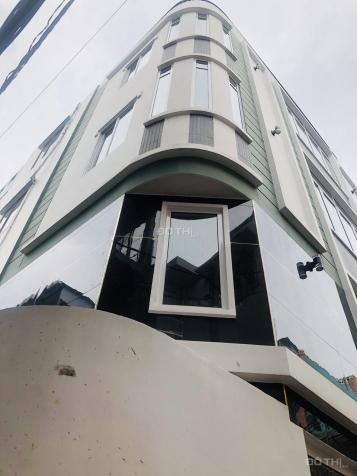 Cho thuê tòa nhà văn phòng mặt tiền đường Nguyễn Thị Minh Khai, Quận 1 (18x22m), hầm, 4 lầu 12901018