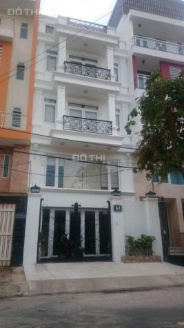 Cho thuê nguyên căn nhà MT Trần Quang Khải, Q.1, DT: 4.2x20m 12936232