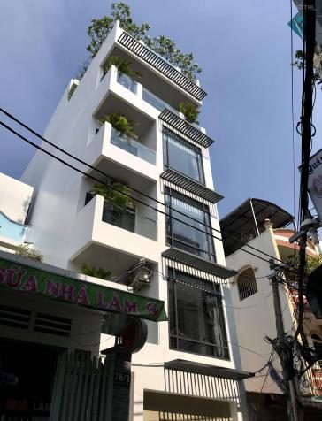Bán tòa nhà rẻ nhất đường Nguyễn Đình Chiểu, P6, Q3. DT: 105m2, hầm, 9T, HĐ 120tr/th 13035388