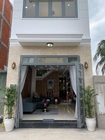 Nhà mới có thang máy, 1 trệt 4 lầu, đường Hà Huy Giáp. Gần cao đẳng Điện Lực 13203458