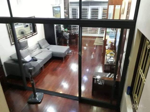 Bán nhà Đại Cồ Việt, nhà đẹp, gara, vỉa hè rộng, KD, văn phòng, lô góc, 50m2, MT: 5m 13260546