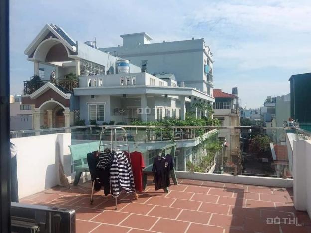 Nhà mt Trần Thái Tông 4 tầng, 63m2, 4.5x14m giá tốt 6.9 tỷ, nhà mới đẹp ở, kinh doanh đều đỉnh 13354591