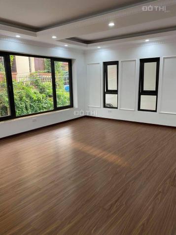 Bán nhà Hoàng Đạo Thành, 70m2*7 tầng, MT 7m, lô góc, oto tránh, thang máy, giá 10.8 tỷ 13360864