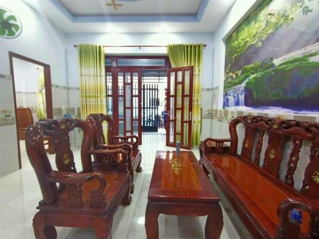 Bán nhà 1 trệt 1 lầu 70m2, hoàn công TT Thuận An sân xe hơi, SHR, tặng nội thất. LH 0394428926 13608833