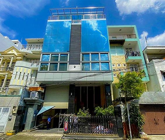 Bán tòa nhà văn phòng mặt tiền Lam Sơn Tân Bình 1 hầm 7 tầng 10.5x25m 13737633