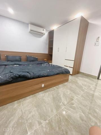 Giá rẻ 3 tầng, 3 phòng ngủ, 3WC, nhà đẹp mặt tiền Trần Thái Tông 13944380