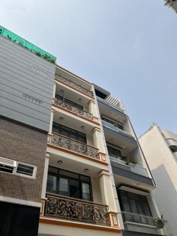 Bán nhà đẹp, hẻm 4m, Nguyễn Hữu Tiến Q. TP, 4x10m, 5 tầng, 4PN, giá chạm đáy 4.5tỷ 13951909
