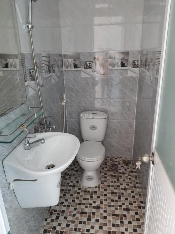 Bán căn nhà 3 lầu đúc kiên cố, sàn BTCT, gần chợ Đường - Hà Huy Giáp, Q. 12 13496324