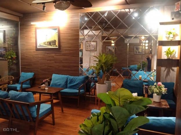 Bán nhà tập thể tầng 1 Nghĩa Tân, dt 110m2, mặt tiền 8.5m, vỉa hè, kinh doanh cafe. Giá 6 tỷ, sổ cc 14090717