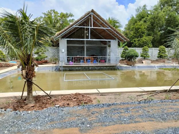 Bán 1 công đất vườn ngang rộng 30m, đã làm nhà vườn sinh thái, đường xe 5 tấn, cách Quốc lộ 700m 14181500