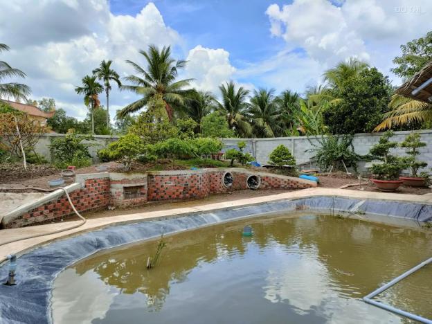 Bán 1 công đất vườn ngang rộng 30m, đã làm nhà vườn sinh thái, đường xe 5 tấn, cách Quốc lộ 700m 14181500