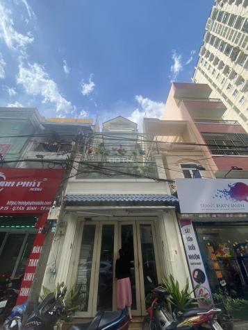 Chuyển công tác bán nhà 4 tầng ngay KDC đông đúc Tân Bình, buôn bán được, có sổ hồng bao sang tên 14201583