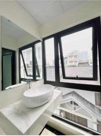 Bán tòa nhà VP đường Lê Đức Thọ. DT 110m2 x 8 tầng thang máy. MT 6m. Giá 36 tỷ 14441524