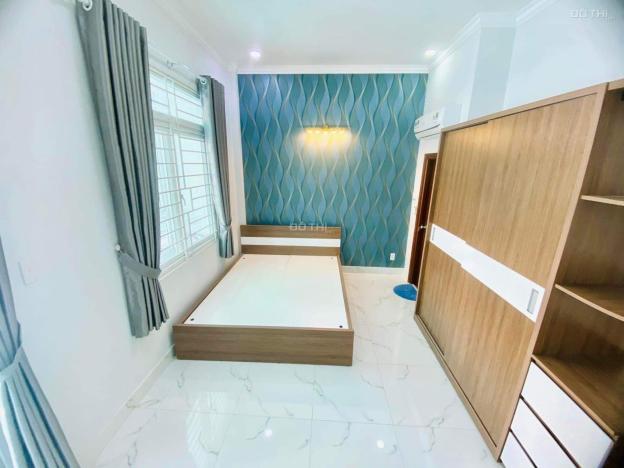 Nhà mặt tiền đường, tặng nội thất hơn 100m ra Phạm Văn Đồng 14463987