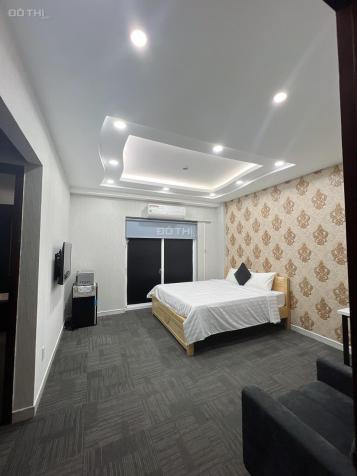 Bán khách sạn 12phòng mới 100% trung tâm Phú Mỹ Hưng với giá rẻ 14658361