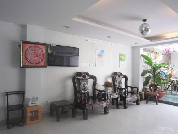 Bán gấp hai căn nhà nối đuôi nhau, hai mặt tiền. Mỗi căn có diện tích 7x18m. 14786061